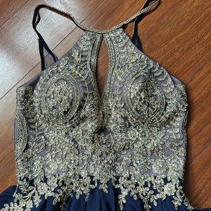 Stunning navy and gold short prom dress.